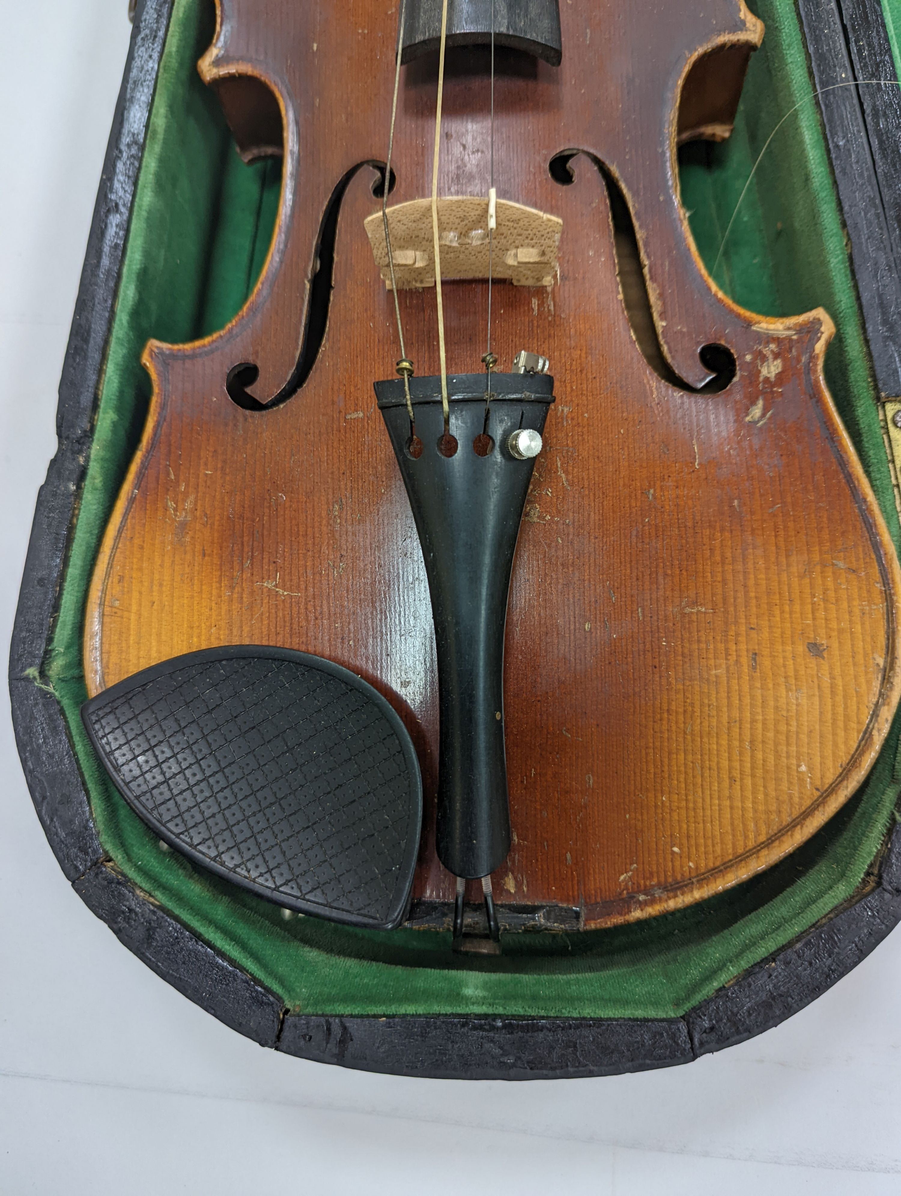 Two cased violins and bows, one with ‘Antonius Straduarius Cremonensis Faciebat Anno 17/13 Made In Czechoslovakia’ label to interior